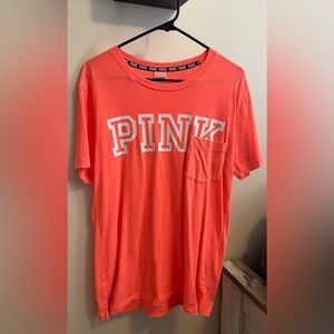 Small VS PINK- oversized t-shirt with front pocket. This shirt is bright orange